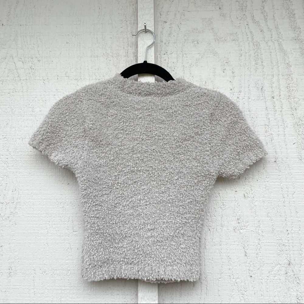 green SKIMS cozy top